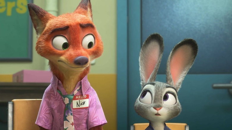 Nick and Judy sitting next to each other and looking at one another in Zootopia 2