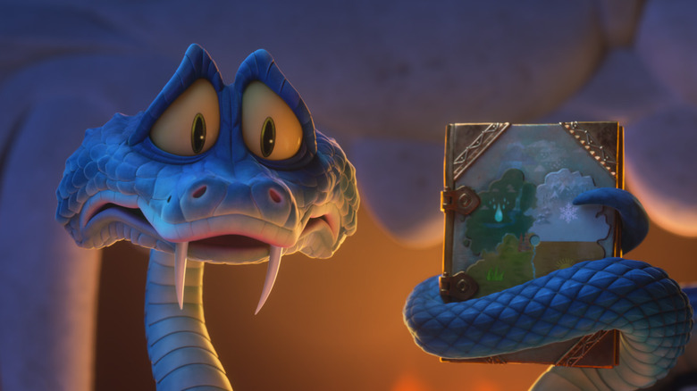 Gary De'Snake looking sadly at a book in Zootopia 2