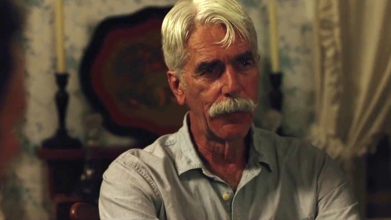 Calvin (Sam Elliott) sitting down in "The Man Who Killed Hitler and Then the Bigfoot"