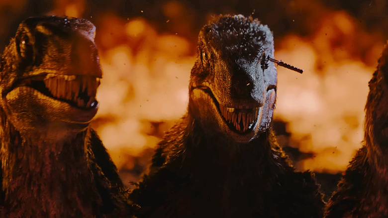 Raptors surrounded in flames in Primitive War