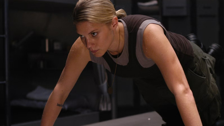 Kara Thrace doing a pushup on Battlestar Galactica