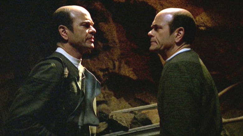 Two nameless hologram men looking at each other on Star Trek: Voyager