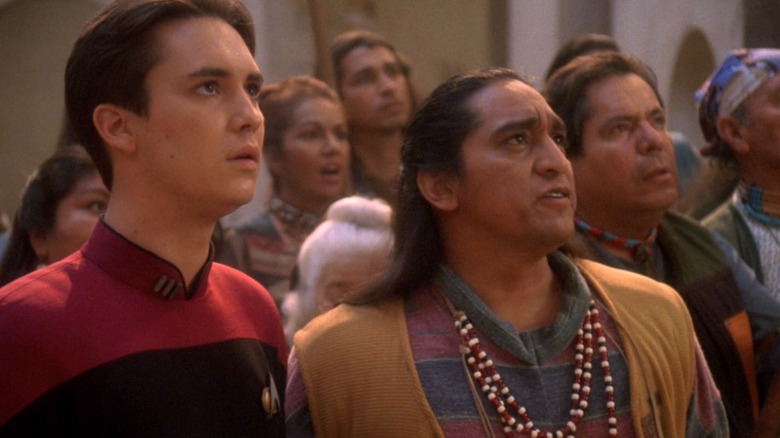 Wesley Crusher and Wakasa looking up at something on Star Trek: The Next Generation