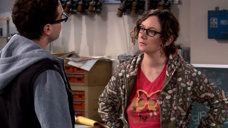 Leslie (Sara Gilbert) looking upset at Leonard (Johnny Galecki) on The Big Bang Theory