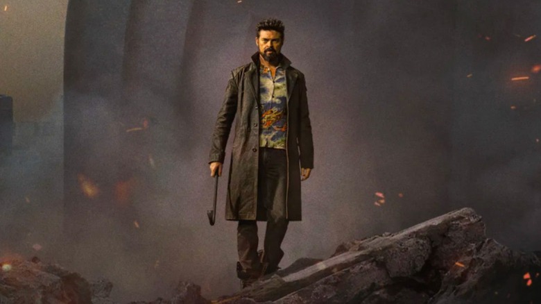 The Boys season 5 poster - Billy Butcher holding crowbar and standing in ruins of Vought Tower