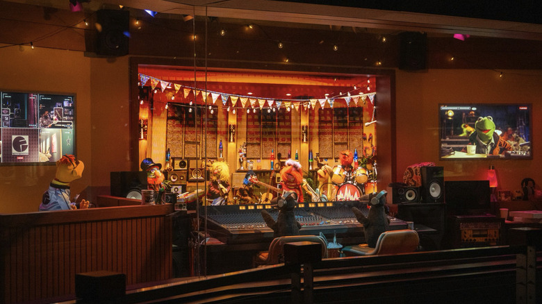 Scooter talking to The Electric Mayhem in a sound booth