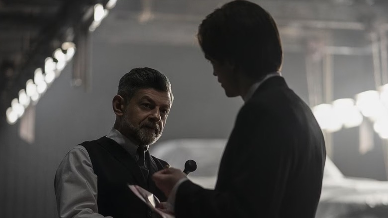 Alfred talking to Bruce