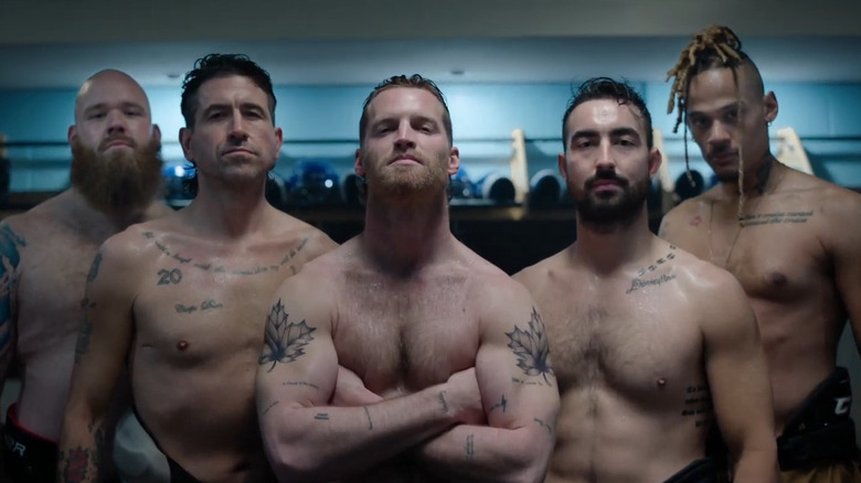 The Sudbury Blueberry Bulldogs standing in a locker room in Shoresy