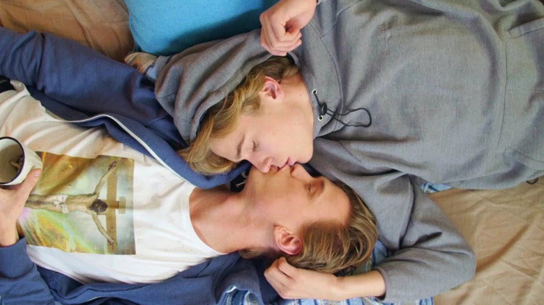 Isak and Even lying down and kissing in SKAM
