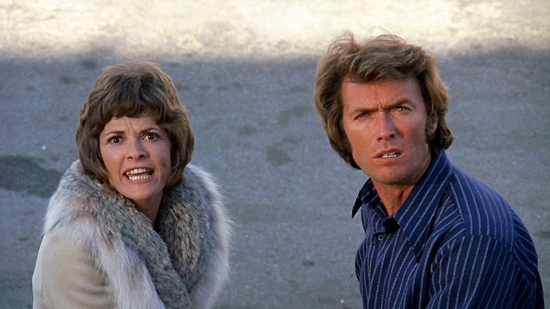Dave (Clint Eastwood) looks surprised and confused as Evelyn (Jessica Walter) angrily yells in Play Misty for Me