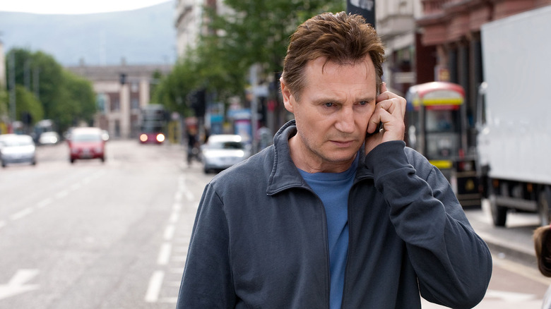 Liam Neeson as Alistair Little listening to his phone in Five Minutes of Heaven