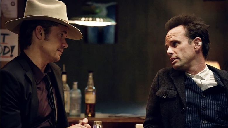 Timothy Olyphant as Raylan Givens and Walton Goggins as Boyd Crowder on Justified