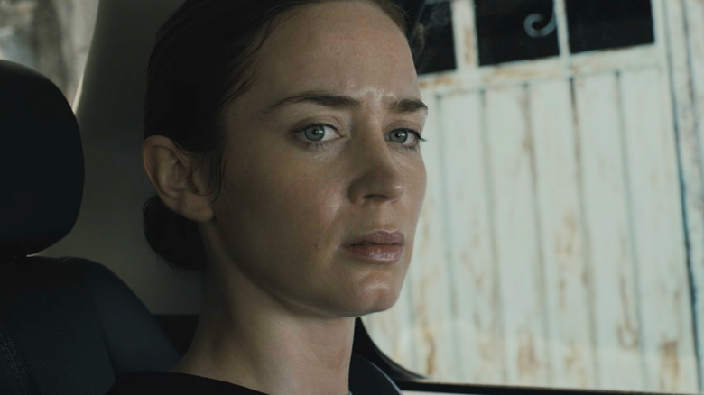 Emily Blunt's Kate Macer looks worried in closeup in Sicario