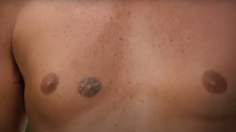 A third nipple can be seen on the chest of Roger Moore's James Bond in The Man with the Golden Gun