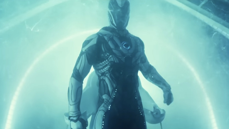 Ben Winchell's Max McGrath stands in a force field of energy in Max Steel