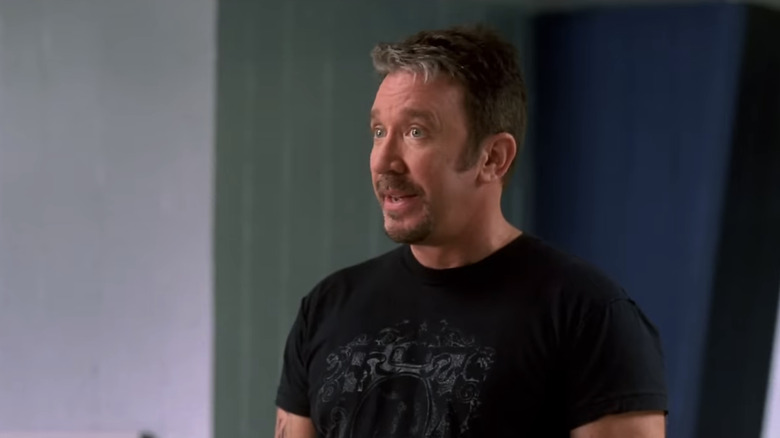 Tim Allen's Jack Shepard /Captain Zoom looking surprised as he stands in a room in Zoom