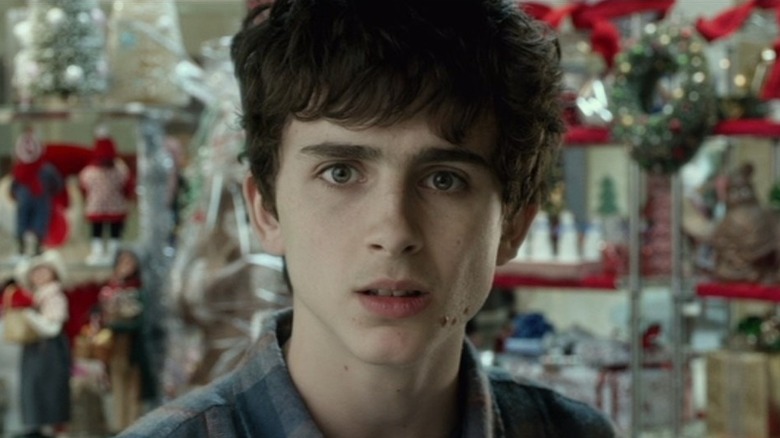 Timothée Chalamet as Charlie Cooper looking shocked in Love the Coopers