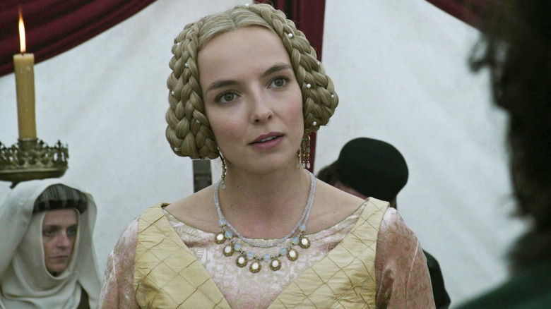 Maguerite wearing a fancy dress in The Last Duel