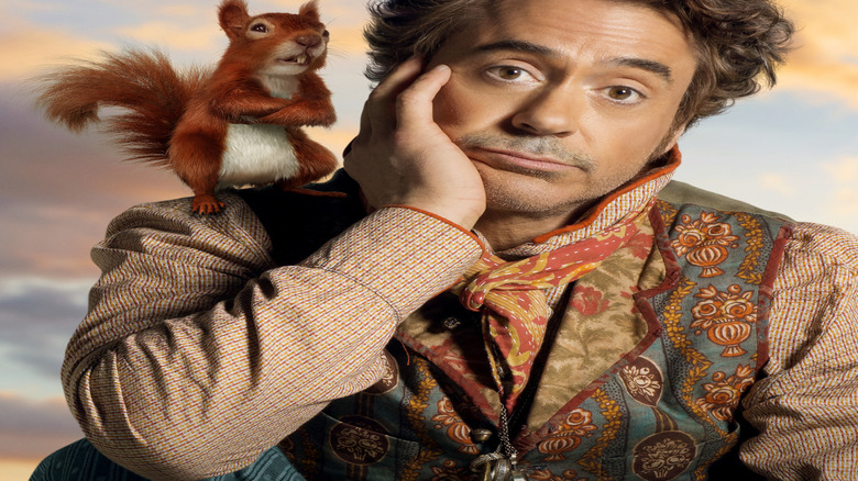 Craig Robinson as Kevin the squirrel with Robert Downey Jr.'s Doctor Dolittle on the poster for Dolittle