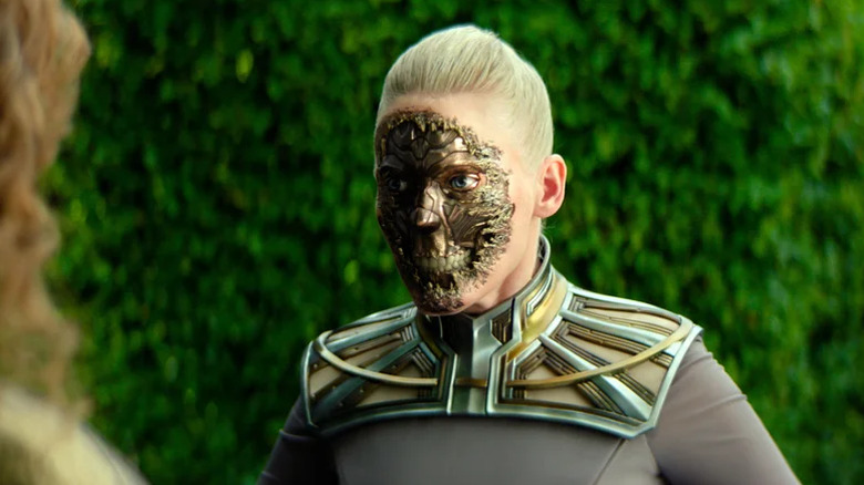 Demerzel shows off her shiny robotic skull to an poor, unsuspectic woman in Foundation