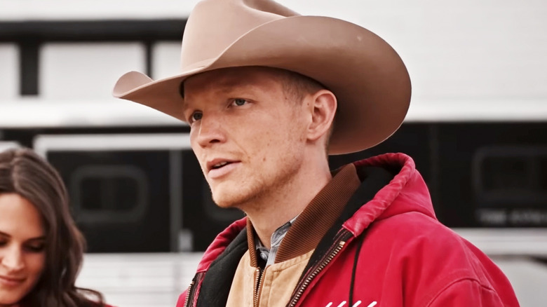 Jefferson White's Jimmy Hurdstram looks across frame wearing a cowboy hat in Yellowstone