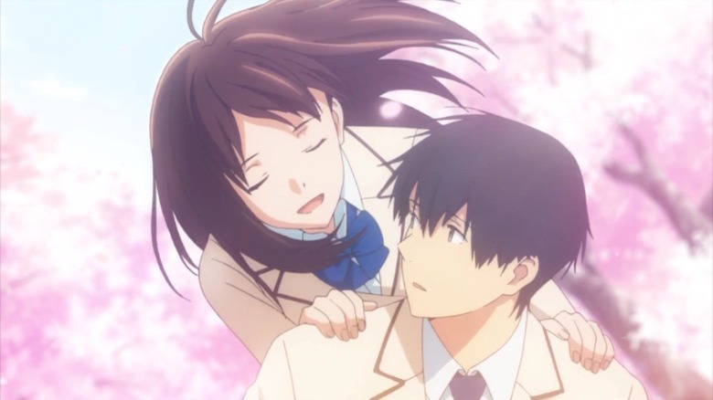 Sakura holds her friend