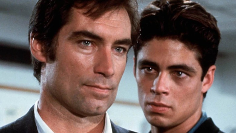 Bond stood in front of Dario
