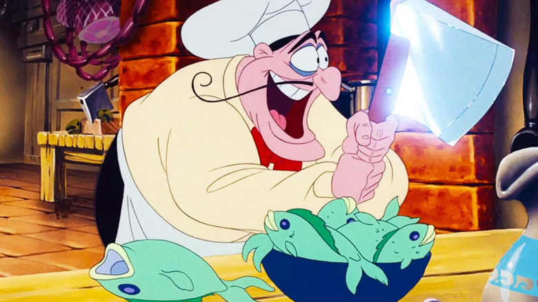 The French chef with a cleaver next to some fish in The Little Mermaid