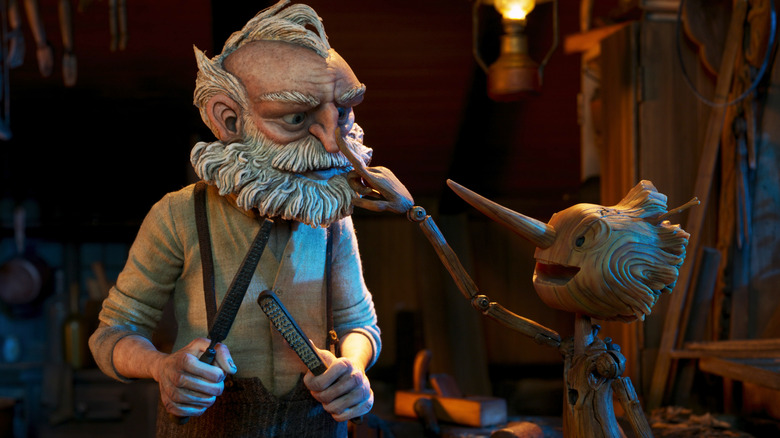 Pinocchio touching Geppetto's nose
