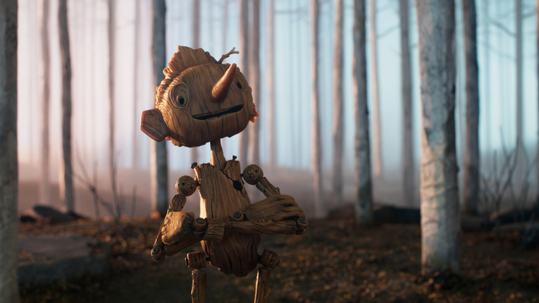 Pinocchio smiling in woods