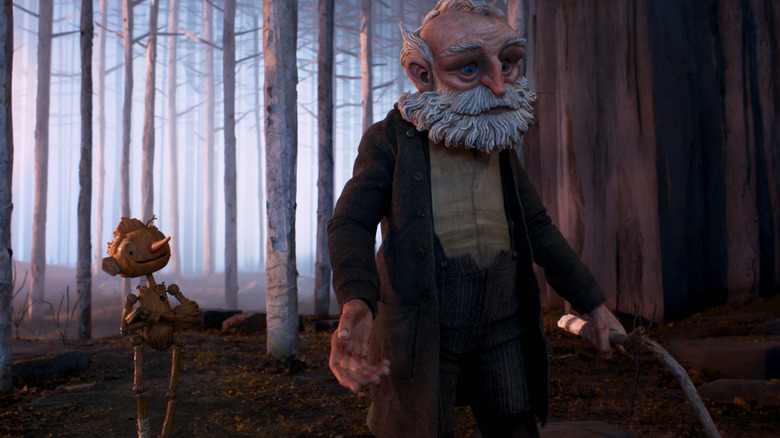 Geppetto and Pinocchio walking in woods