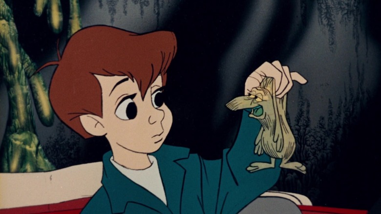 Milo holding one of the Doldrums in The Phantom Tollbooth