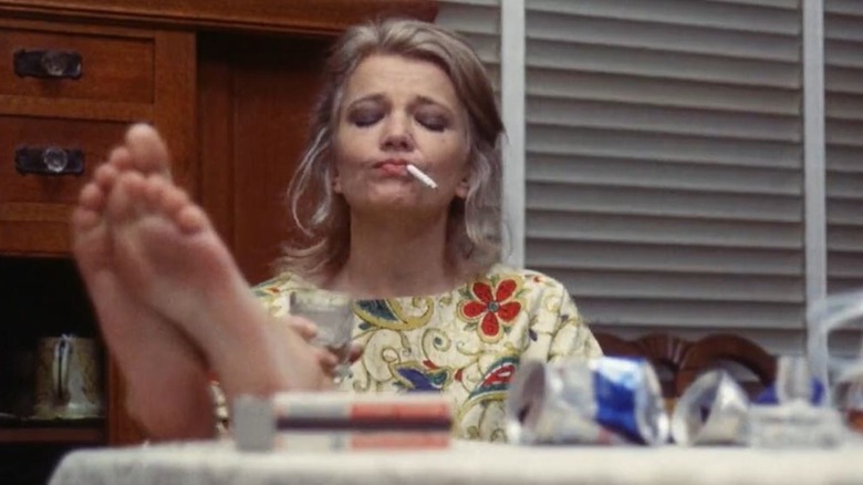 Gena Rowlands kicks up her heels and enjoys a cigarette as Mabel in A Woman Under the Influence