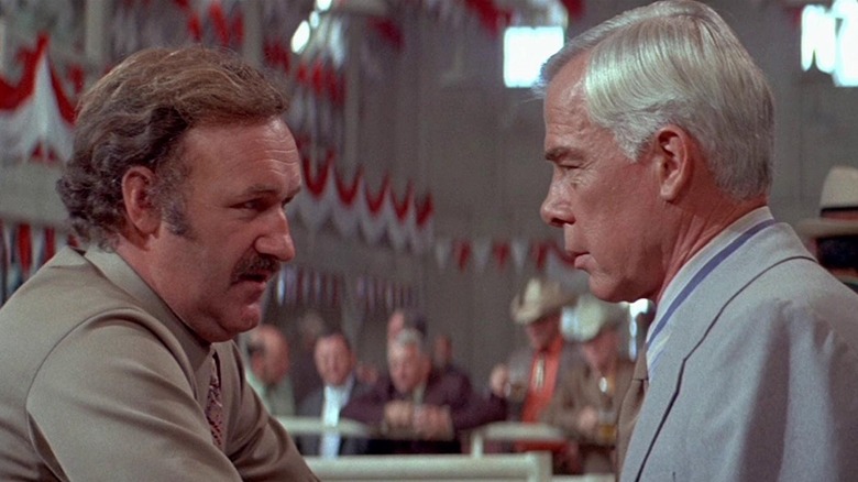 Gene Hackman as Mary Ann faces down Lee Marvin as Nick Devlin in Prime Cut