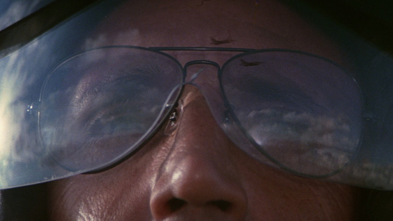 a reflection in Roy Scheider's flight visor