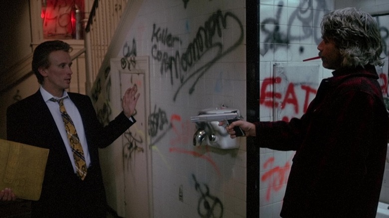 Sam Ellliott quickdraws on Peter Weller