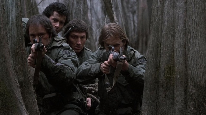 Powers Boothe and Keith Carradine hiding among the trees