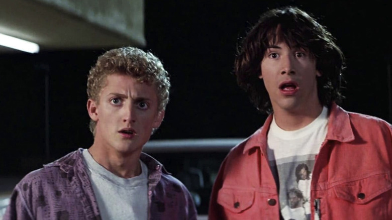 Bill Preston (Alex Winter) and a disheveled Ted Logan (Keanu Reeves) have their mouths agape in Bill & Ted's Excellent Adventure