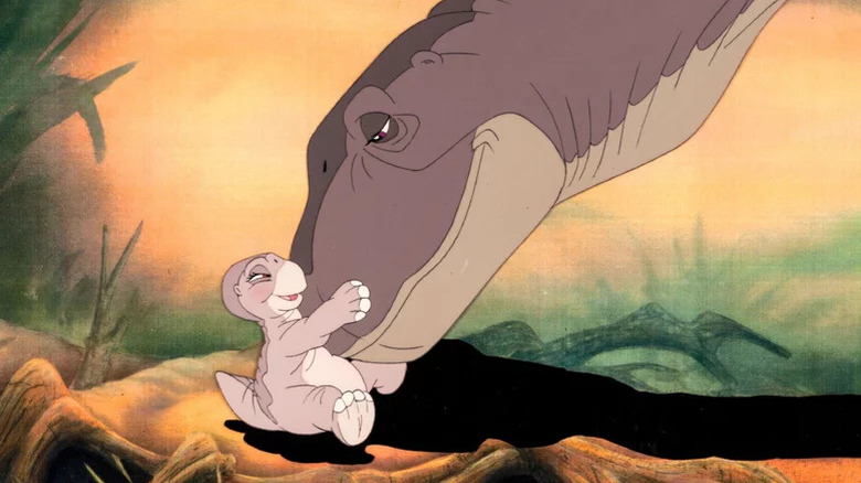 Littlefoot's mother (Helen Shaver) nuzzles Littlefoot (Gabriel Damon) in The Land Before Time