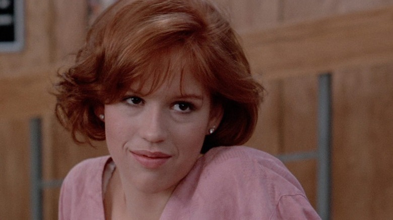 Molly Ringwald flashes a sly smile as Claire Standish in The Breakfast Club