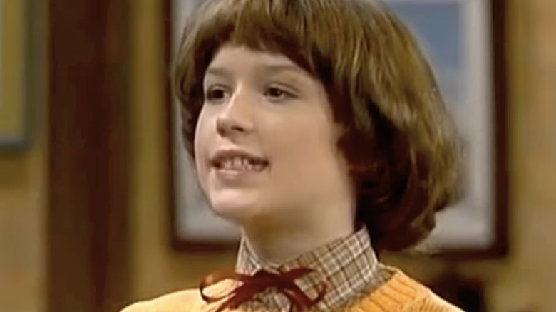 Molly Ringwald croons through crooked teeth as Molly Parker in The Facts of Life