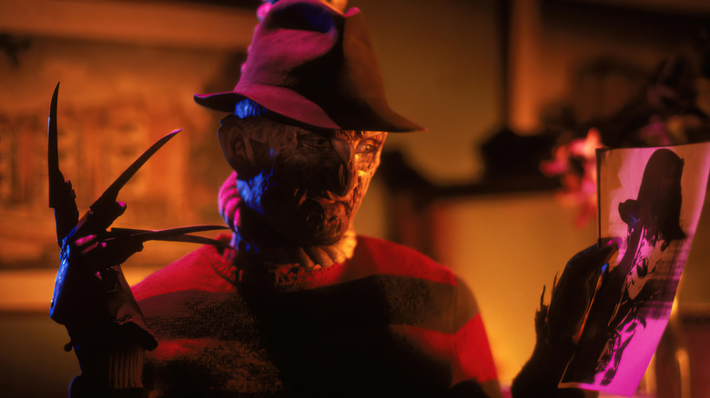 Freddy Kruger holding a photocopy of himself in Freddy's Nightmares