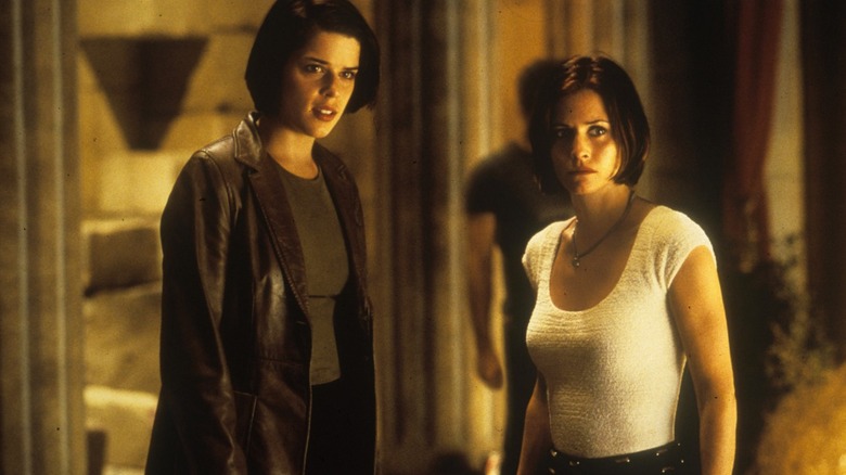Scream 2's Neve Campbell Courteney Cox looking shocked