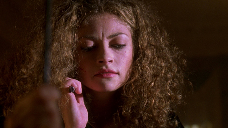 Urban Legend's Rebecca Gayheart holding knife
