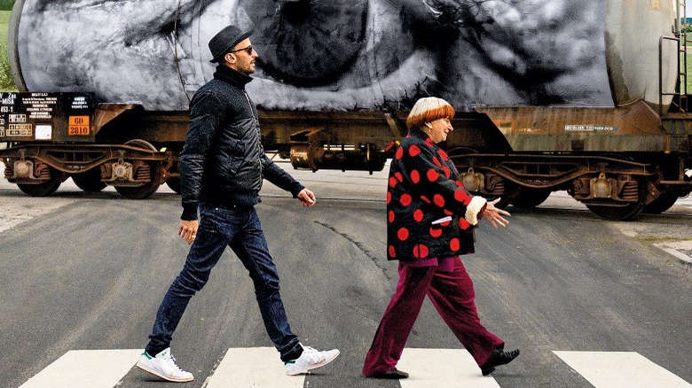 JR and Varda walking together