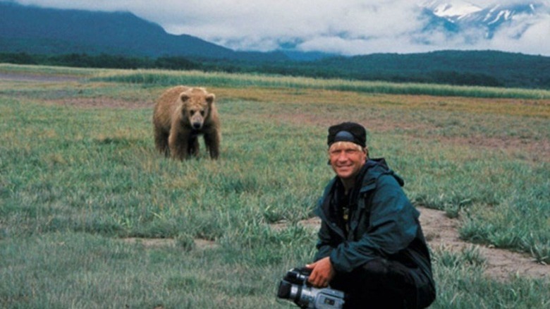 treadwell posing with bear