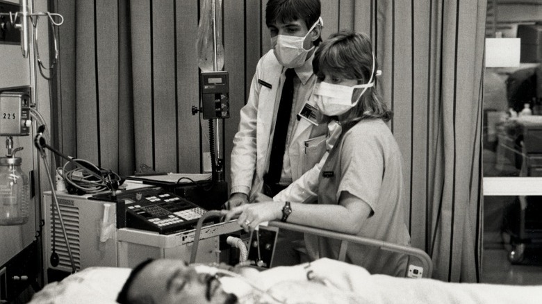 doctors observing patient