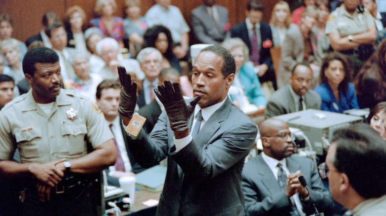 oj simpson trying on gloves