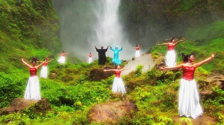 indonesian dancers waterfall