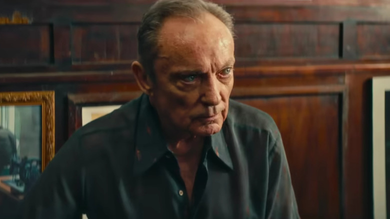 Udo Kier's Hans looking apprehensive in The Secret Agent